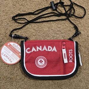 2004 Olympics ROOTS wallet.